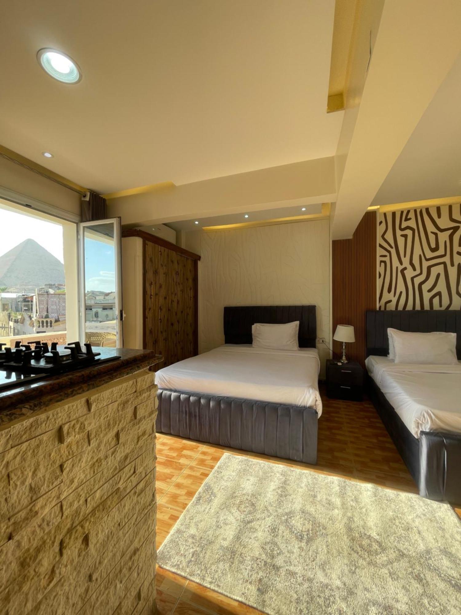Cheops Pyramids Inn Kafrat al Jabal Exterior photo